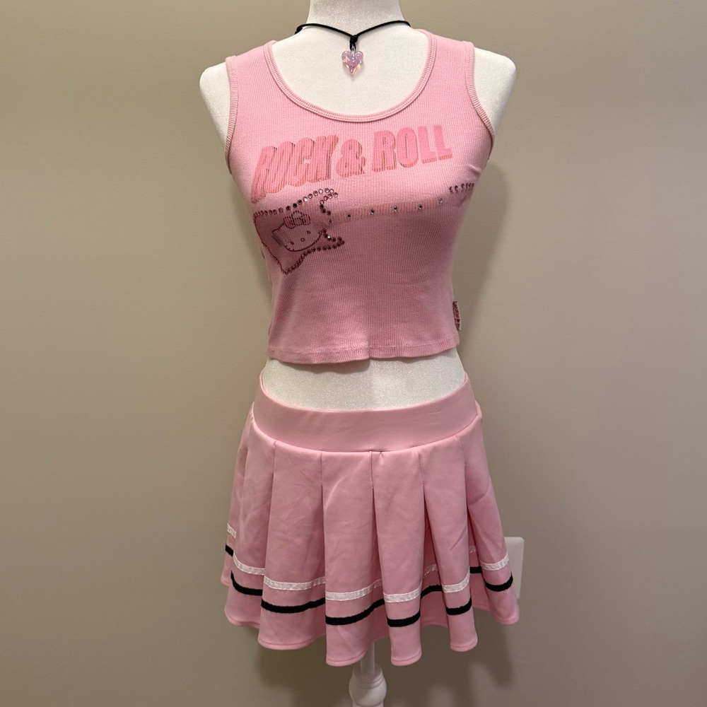 Pink cheerleader skirt by Body Rage, size M